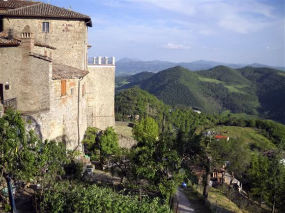 This May 2010 photo shows a view from the hilltop town of Monte Santa Maria Tiberina in the Umbria region of Italy. Umbria boasts beautiful landscapes, terrific food, impressive art and architecture, and a wealth of history. (AP Photo/Kathy Matheson)